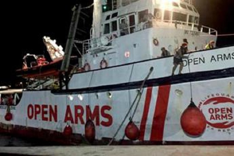 immigrati open arms