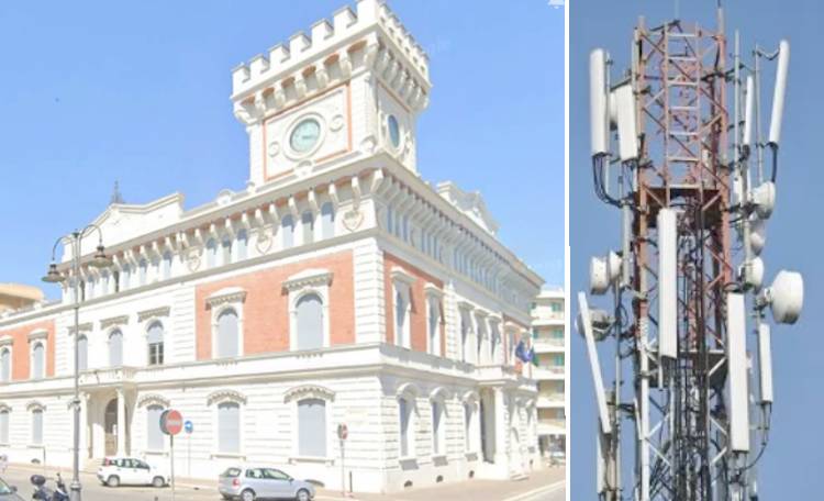 Nettuno, da sinistra la sede del Comune e il traliccio di telefonia mobile