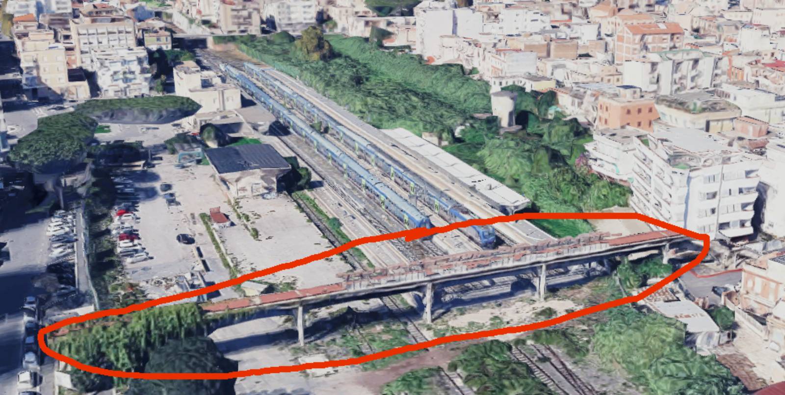 Nettuno, il ponte della ferrovia FS, foto Google Maps