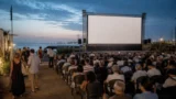 Puntasacra Film Fest 2026 a Ostia: Renato Zero, Verdone e cinema gratis sul mare